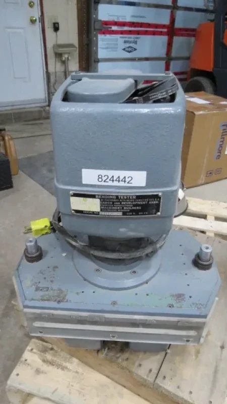 Boxboard Bending Tester - The BRDA bending tester scores and folds paperboard, using different combinations of rule and die widths and die penetration depths. Folds the board along the score line. The unit is self-contained hydraulic, using 110VAC electrical supply.